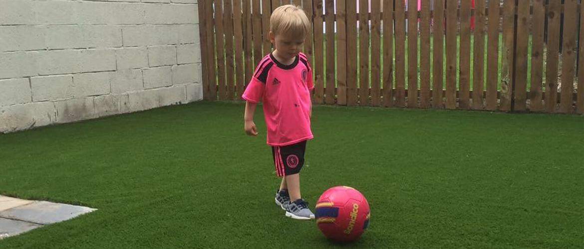 Artificial Grass with young footballer